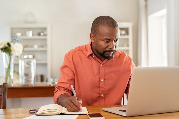 Man works without a home printer scanner copier.