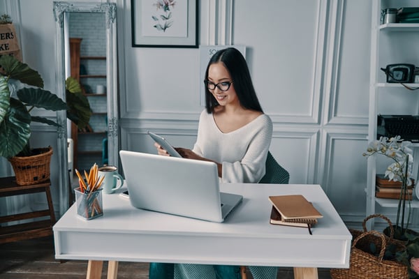 Woman who would benefit from a home printer scanner copier.